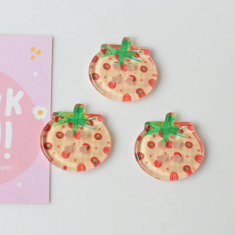 Tomato button ornament made of plastic or resin with printed pattern in medium size mixed colours