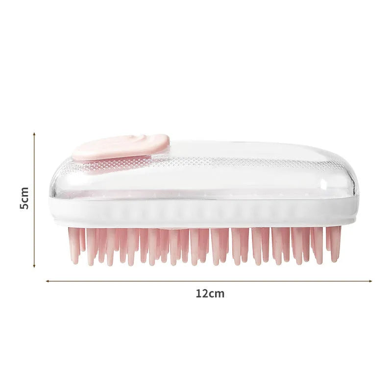 Grey silicone bath brush for pets with soft bristles and ergonomic handle on white background