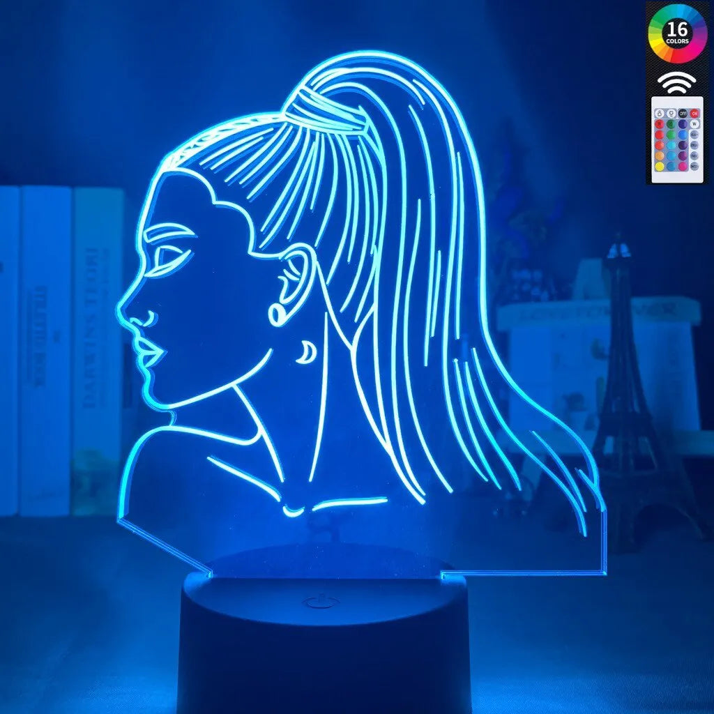 Slim European style acrylic 3D LED night light on a colourful black base, showing remote control.