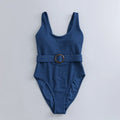 Navy blue women's one-piece swimsuit with triangle neckline and chest pads