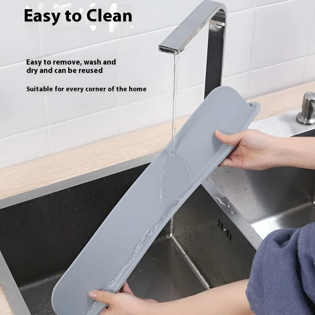 Silicone kitchen sink water blocking plate measuring 52mm wide x 5mm thick x 85mm tall in grey blue colour