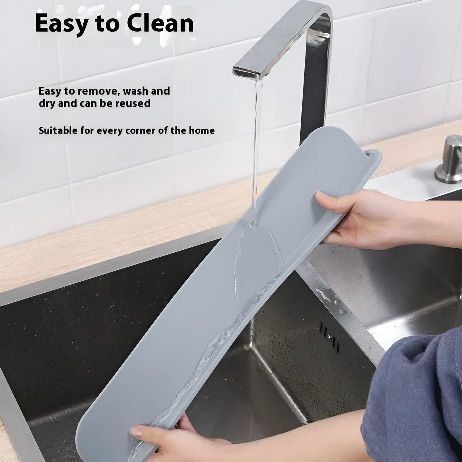Silicone kitchen sink water blocking plate measuring 52mm wide x 5mm thick x 85mm tall in grey blue colour