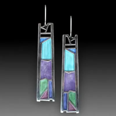 Water drop irregular oil color silver alloy women's drop earrings on white background