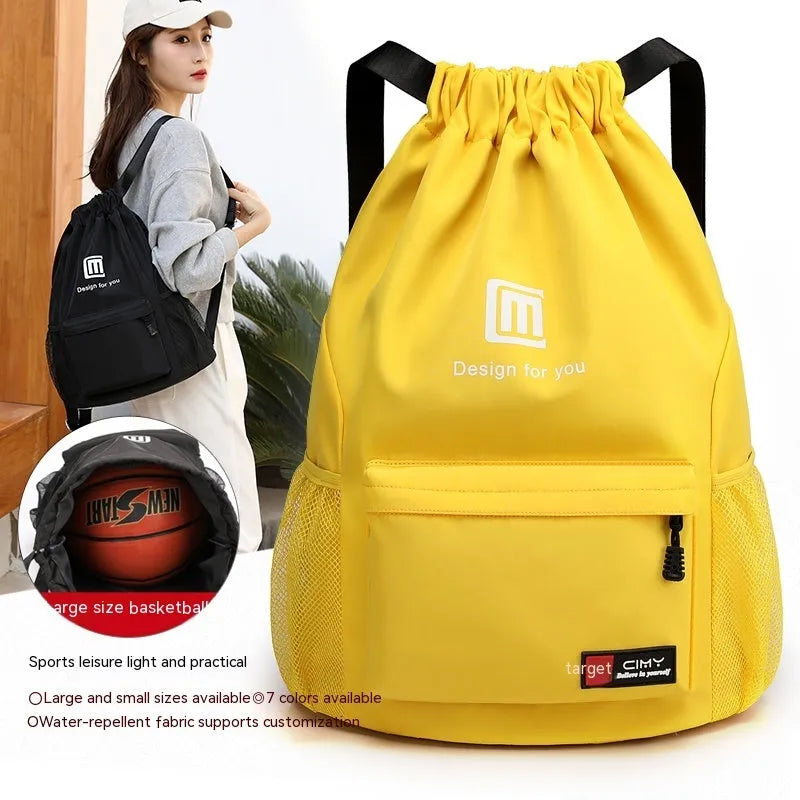 Oxford fabric drawstring backpack in black with phone compartment, shown in folded and unfolded positions