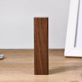 Portable black walnut solid wood power bank with 2000mAh capacity, brown colour, 100mm cylindrical design