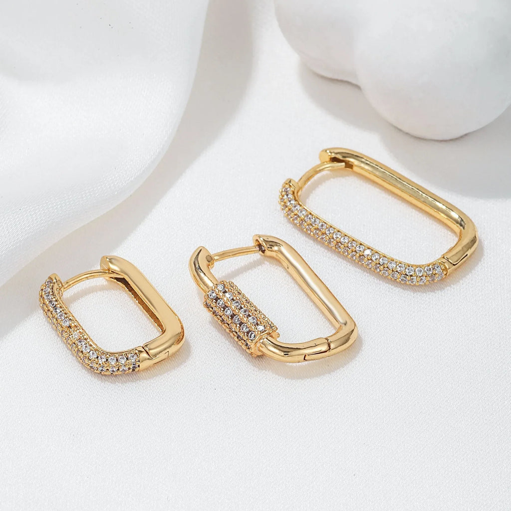 Geometric three-piece ear clip set with micro inlaid zircon detailing on copper in gold and white colour options