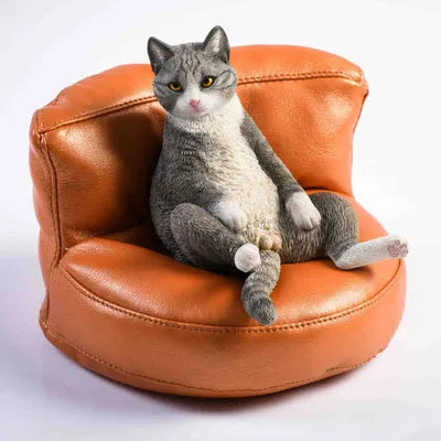 Lazy cat car ornament with sofa on dashboard, 1:6 scale resin and fabric construction