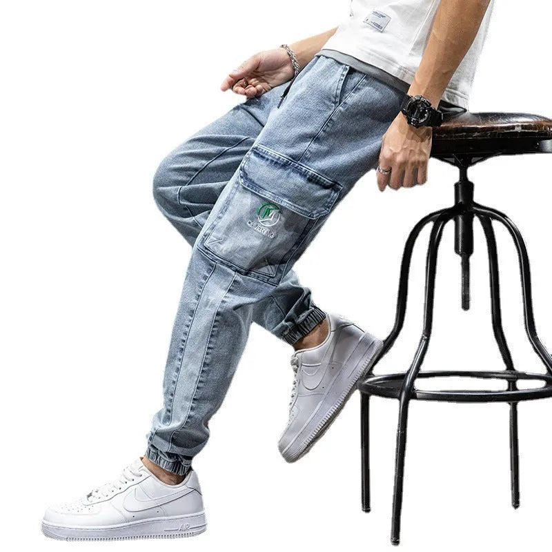 Men's loose fit cargo jeans in blue with straight leg cut and micro elasticity fabric