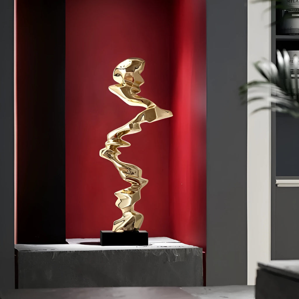 Modern abstract still life sculpture ornament in bright gold, elegant silver, or phantom blue.