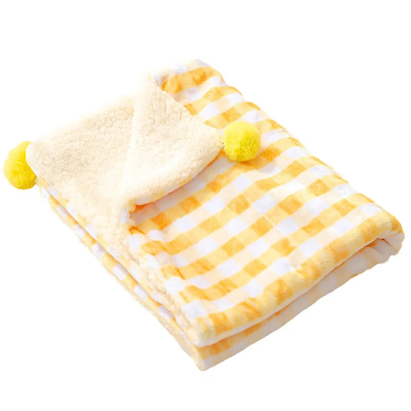Thickened coral fleece dog blanket in blue on a sofa, size L 70x50cm