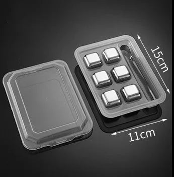 Set of 8 stainless steel ice cubes in square and ball shapes with plastic storage box and tong on a wooden surface