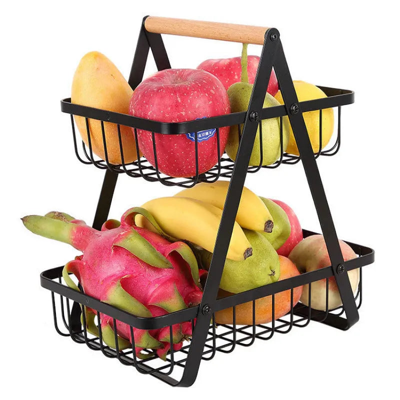 Detachable double-layer iron fruit basket with wooden handle in black on a tabletop