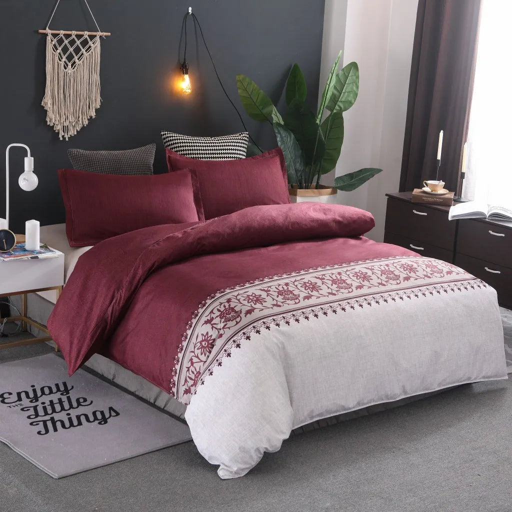 Polyester quilt cover set with edging craft, plain weave, in wine red colour on a bed