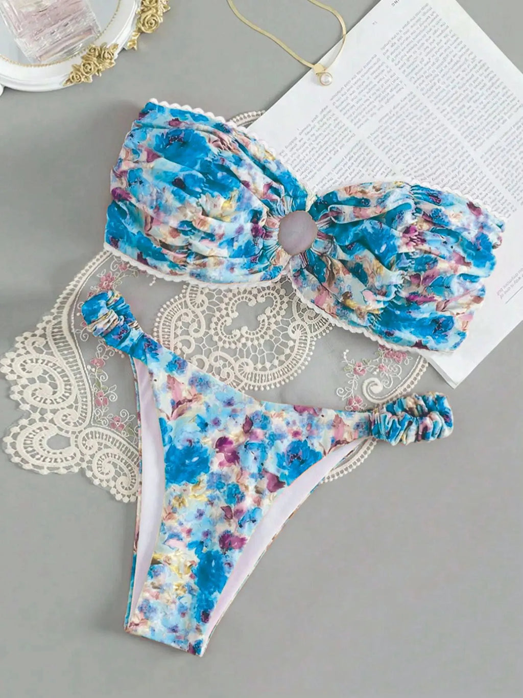 Women's floral lace trim bikini set with sleeveless tube top and matching briefs in backless design