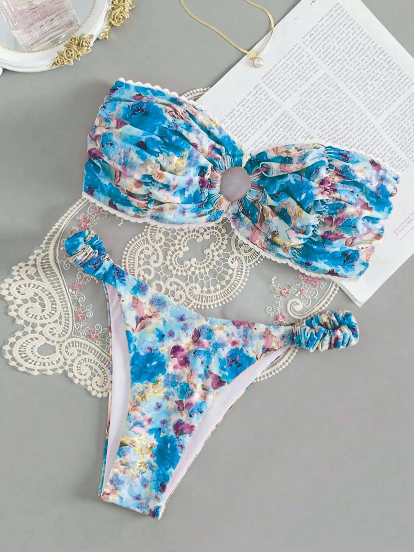 Women's floral lace trim bikini set with sleeveless tube top and matching briefs in backless design