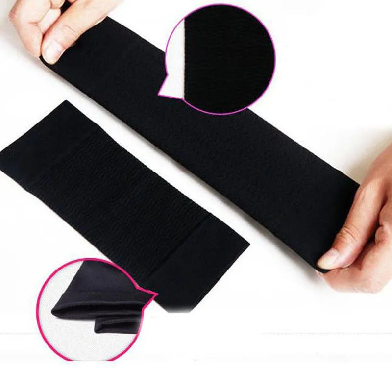 Arm and leg sleeves slimming shaper in black colour, showing wave pattern design on inner surface