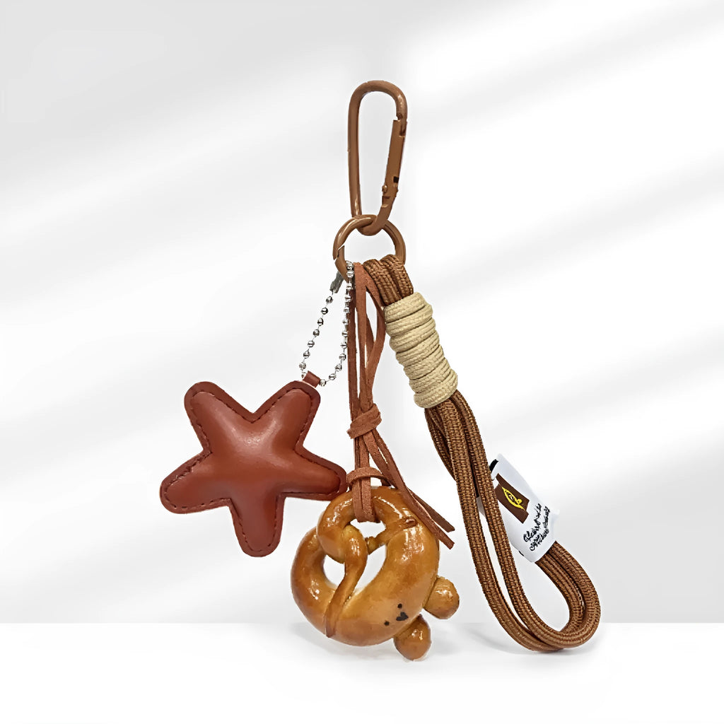 Handmade soda bread design handbag pendant with brown strap and five-pointed star