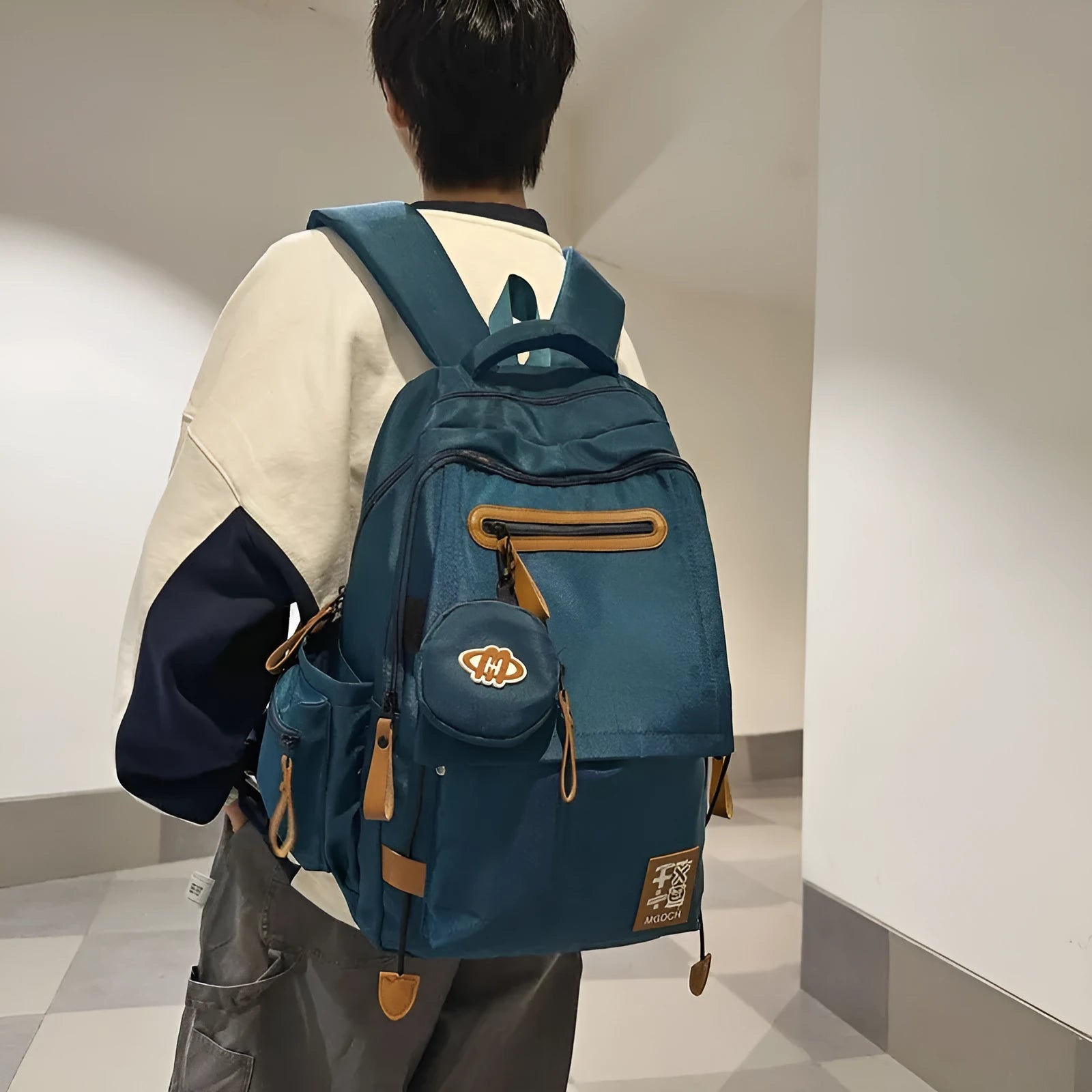 Large nylon school backpack for junior high school students with curved shoulder straps, shown in a solid colour.