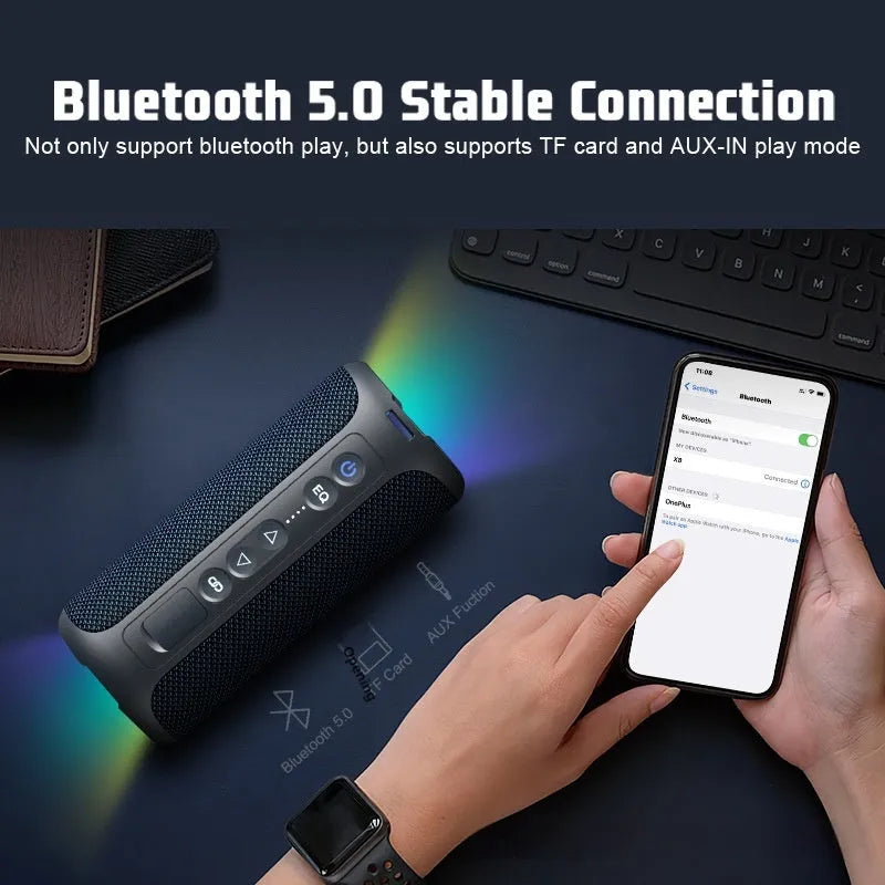 Black and blue fabric Bluetooth speaker with LED lights, showing side view with control buttons.