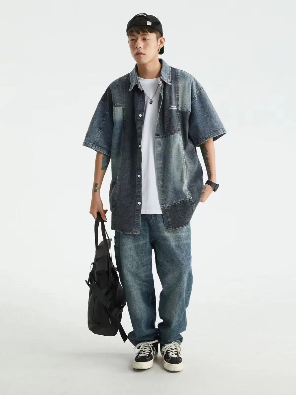 Blue Japanese-inspired men's denim shirt with washed stitching and loose cardigan fit