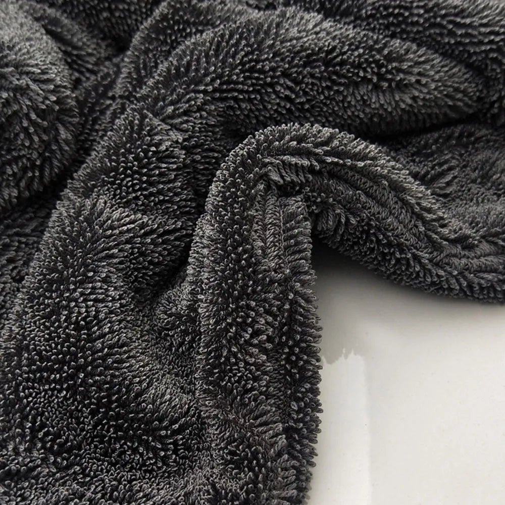Grey 40x40cm square microfiber car wash and drying towel laid flat