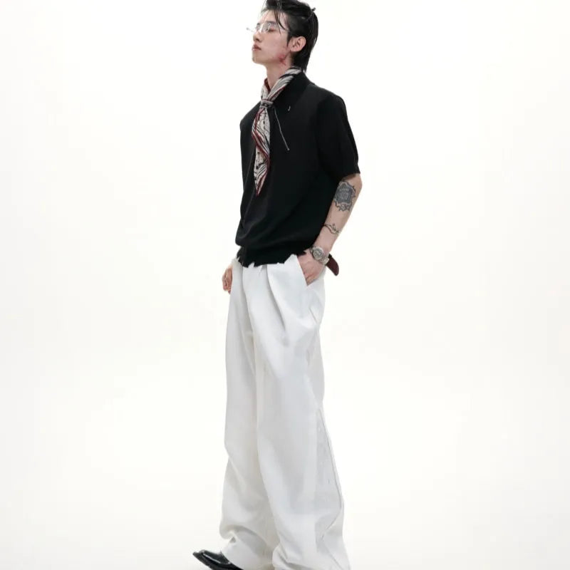 Slim fit grey knitted polo shirt with an oblique diagonal zip and short sleeves on a mannequin.