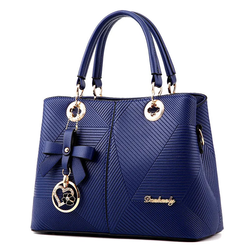 Retro style PU handbag with a zipper and shoulder strap in a choice of colours.