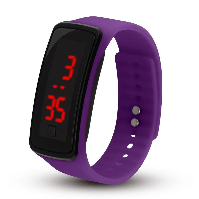 LED bracelet watch with plastic rectangular case and digital display showing time and date