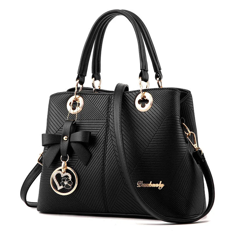 Retro style PU handbag with a zipper and shoulder strap in a choice of colours.