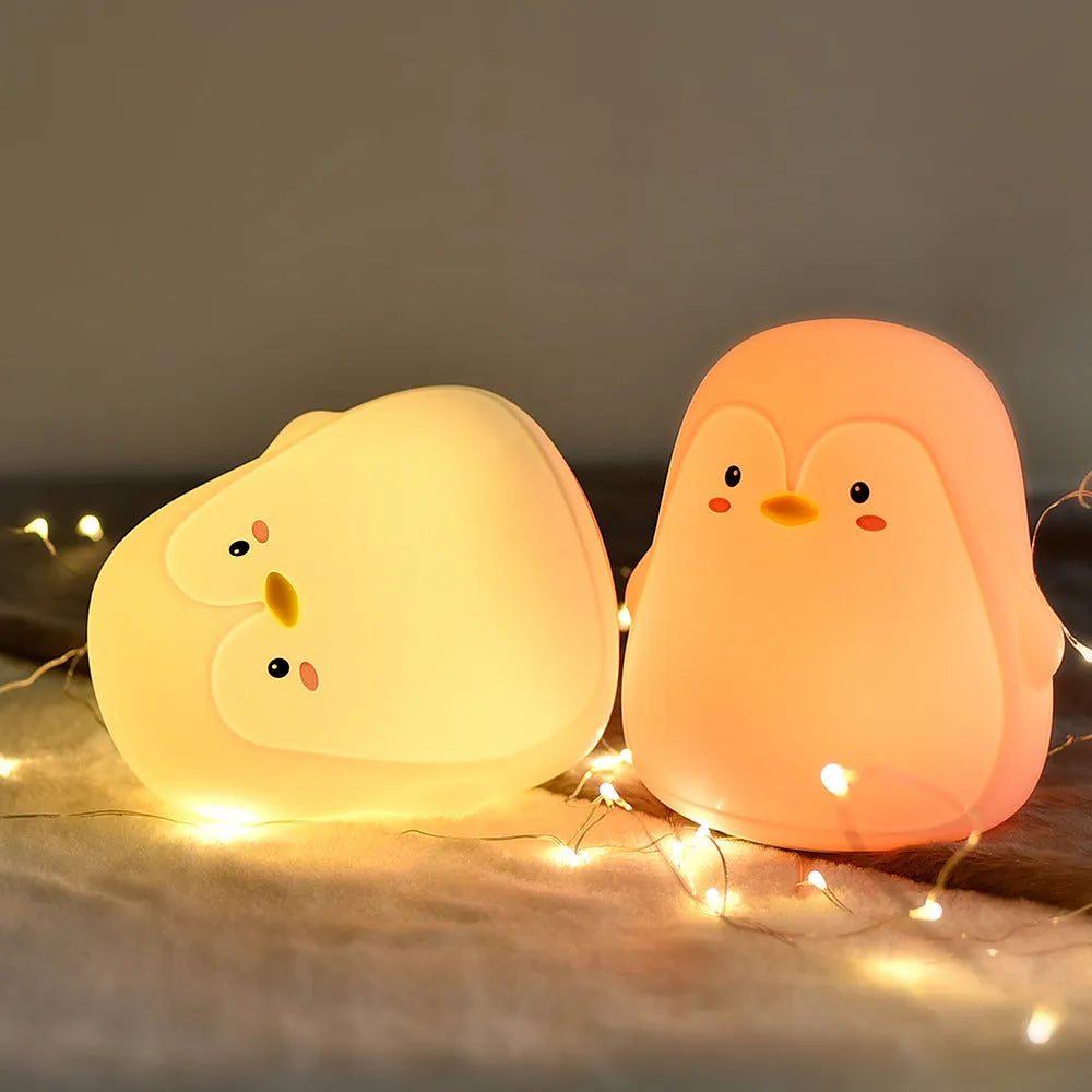 Penguin night light in white with silicone body and USB cable, 118x110x132mm