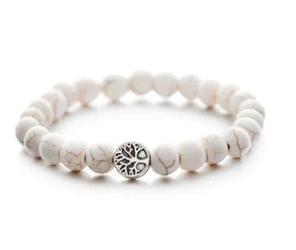 Alloy volcano white turquoise natural stone bracelet with adjustable cord on neutral background