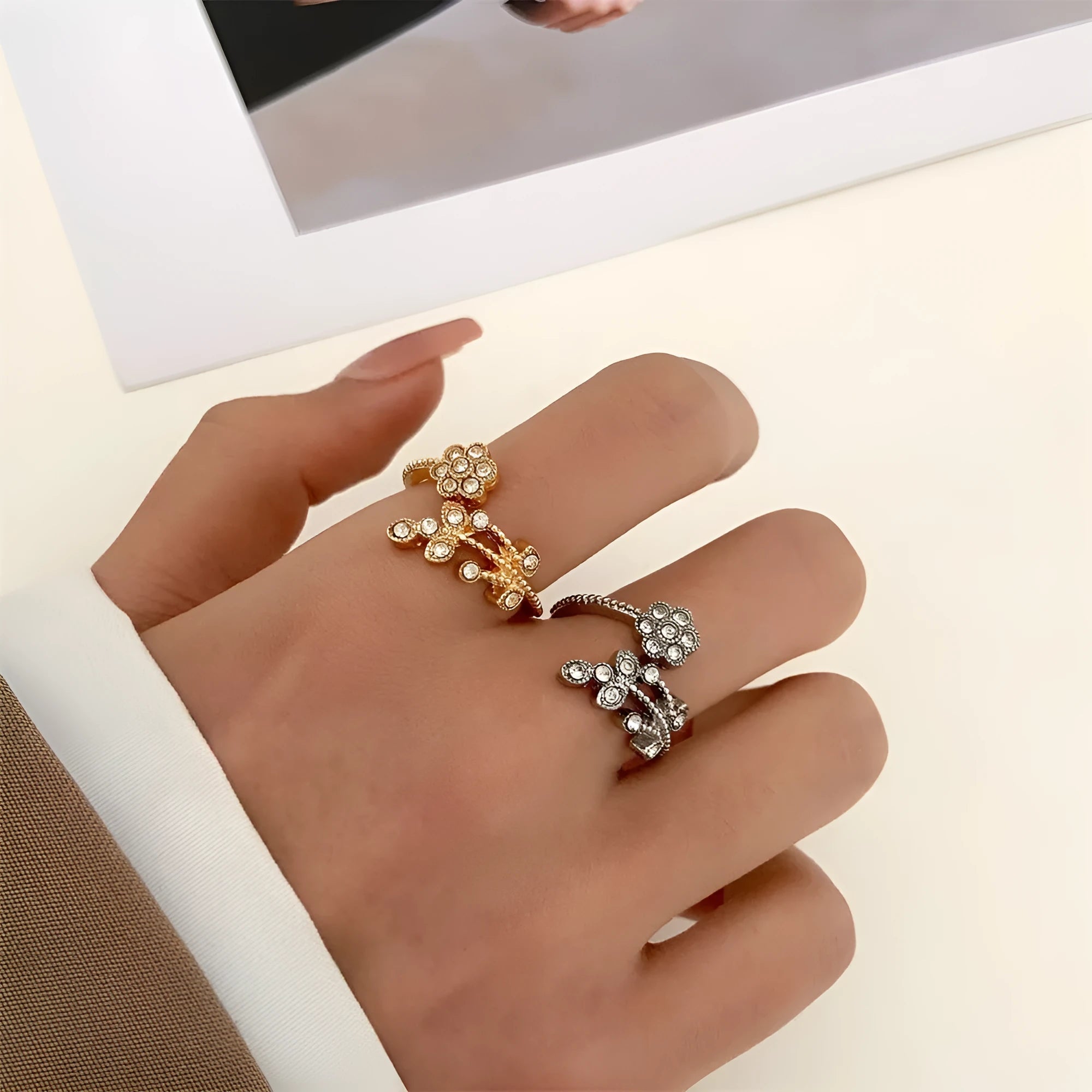 Open mouth copper ring with flower and leaf design in gold finish