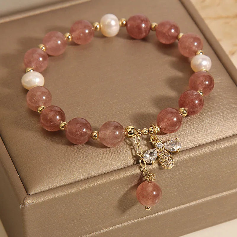 Women's freshwater pearl and strawberry quartz bracelet with zircon accents and adjustable closure