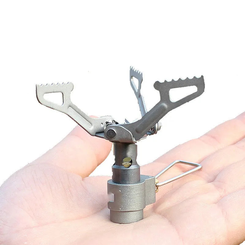 Portable one-piece propane gas camping stove for outdoor cooking.