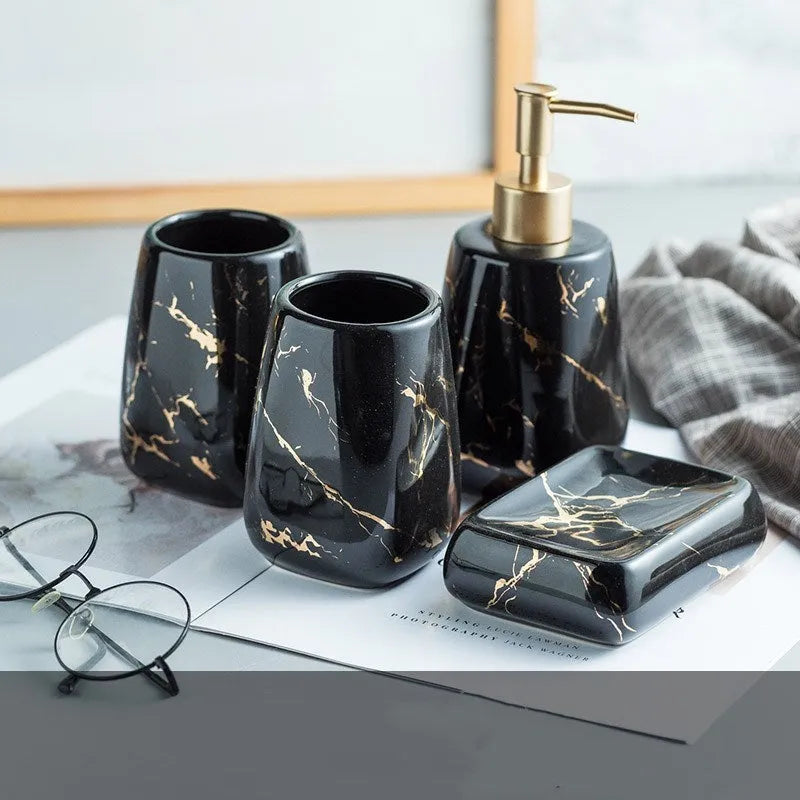 Ceramic bathroom wash set in white with decal finish, three pieces on countertop
