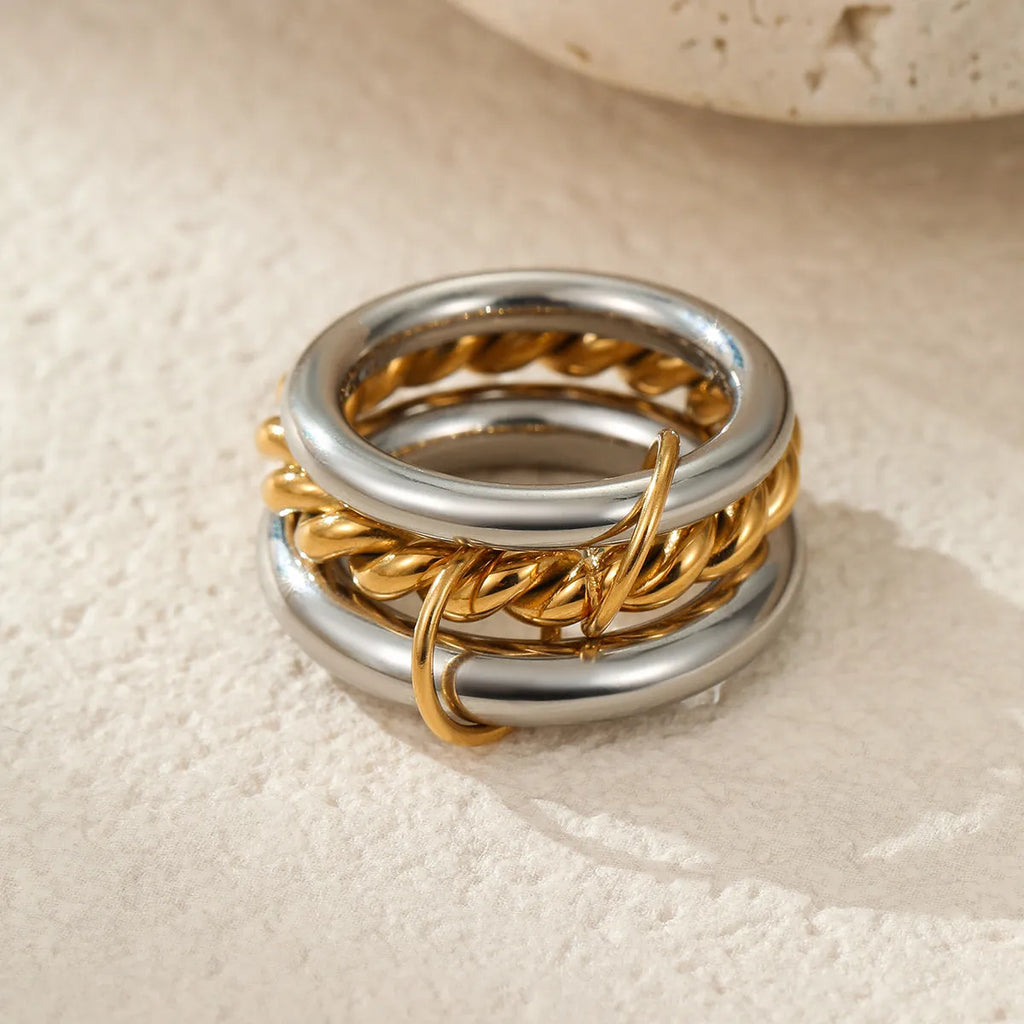 Stacked stainless steel rings with 18K gold plating in colour matching design