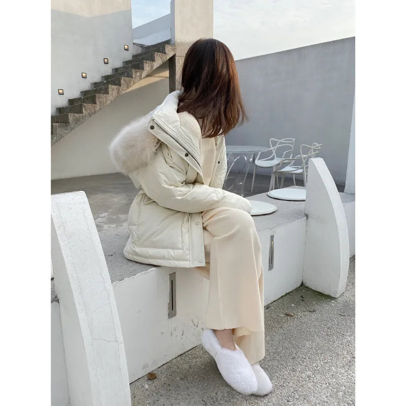 Women's high waist knitted wide-leg trousers in cream white colour with elastic waistband