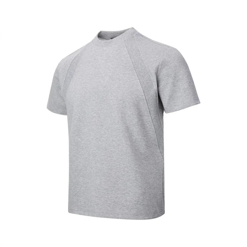 Men's black loose-fit short sleeve top with textured air layer stitching detail.