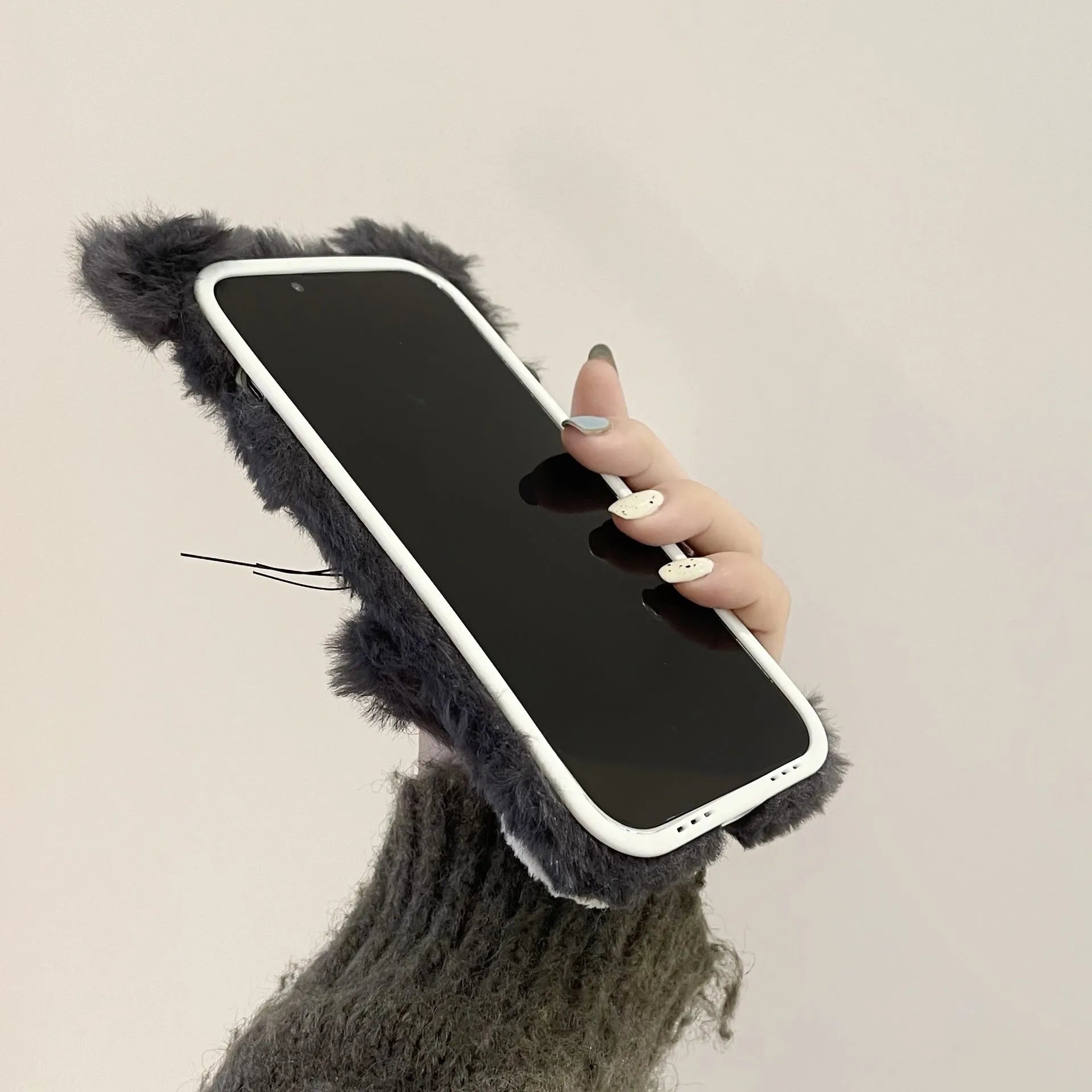 Plush staring cat phone case for iPhone with soft furry texture and love lens design