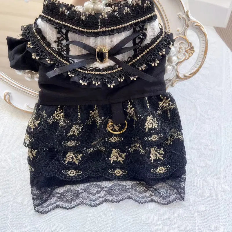Golden gothic princess-style skirt for a small dog or cat on a mannequin.