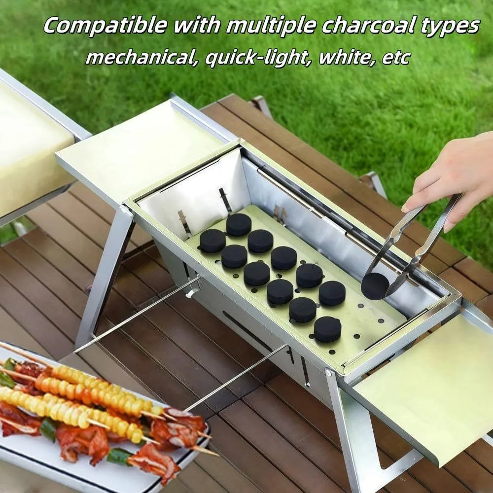 Small portable charcoal grill with folding metal frame for outdoor cooking