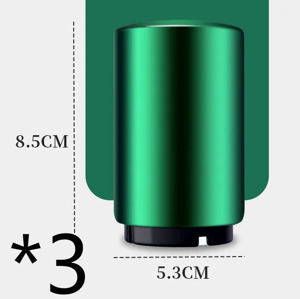 Automatic stainless steel beer bottle opener with magnetic cap catch on a table