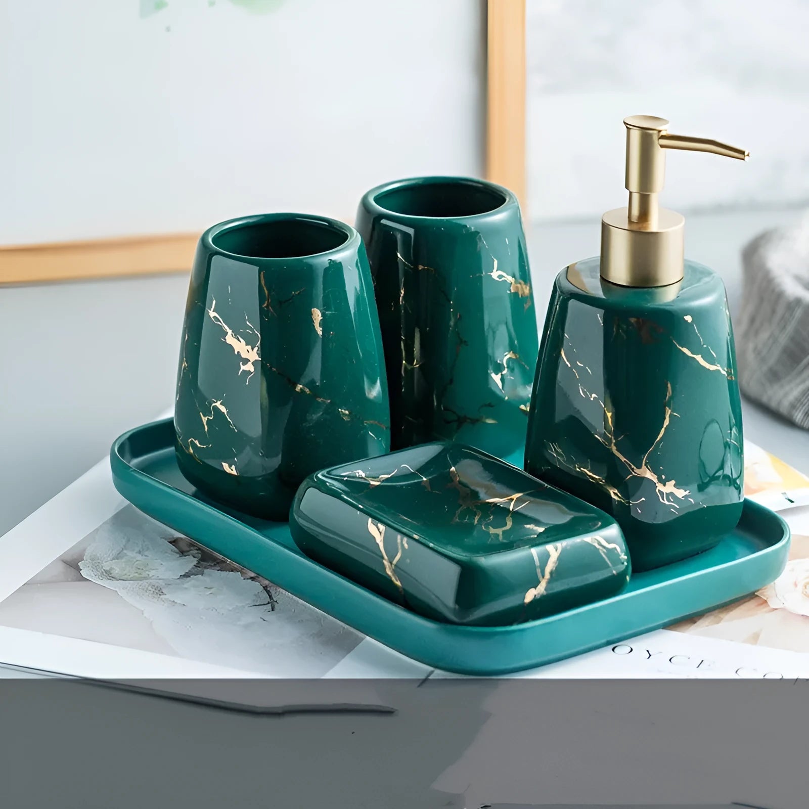 Ceramic bathroom wash set in white with decal finish, three pieces on countertop