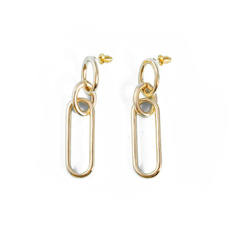 Geometric sterling silver needle coloured hoop earrings for women showing ring and line design elements.