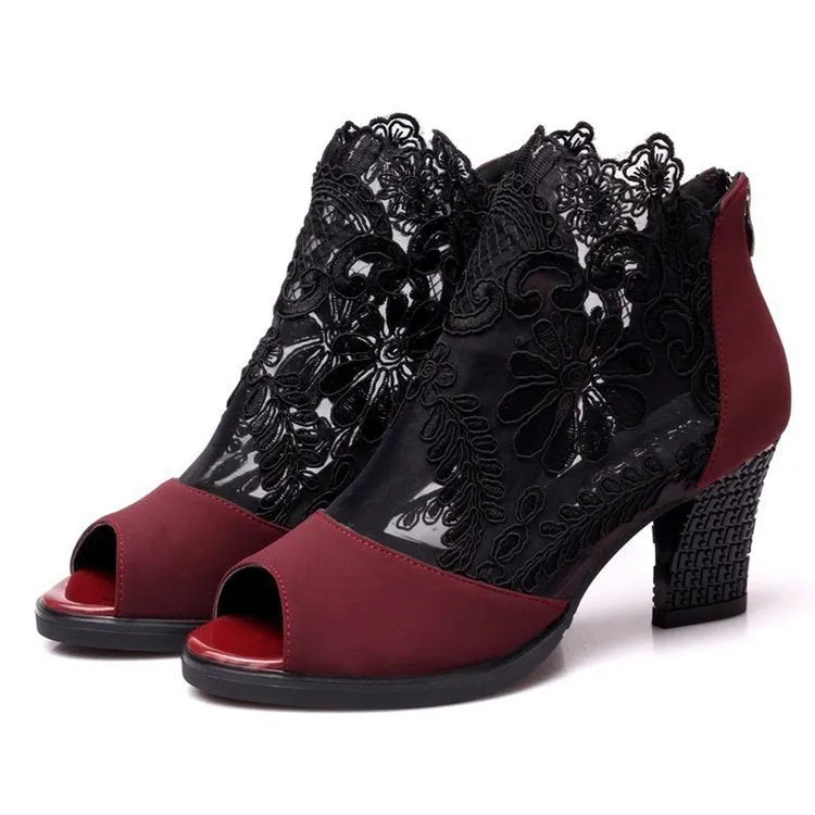 Lucyever women's black lace gladiator sandals with a zip closure and square high heel on a white background.
