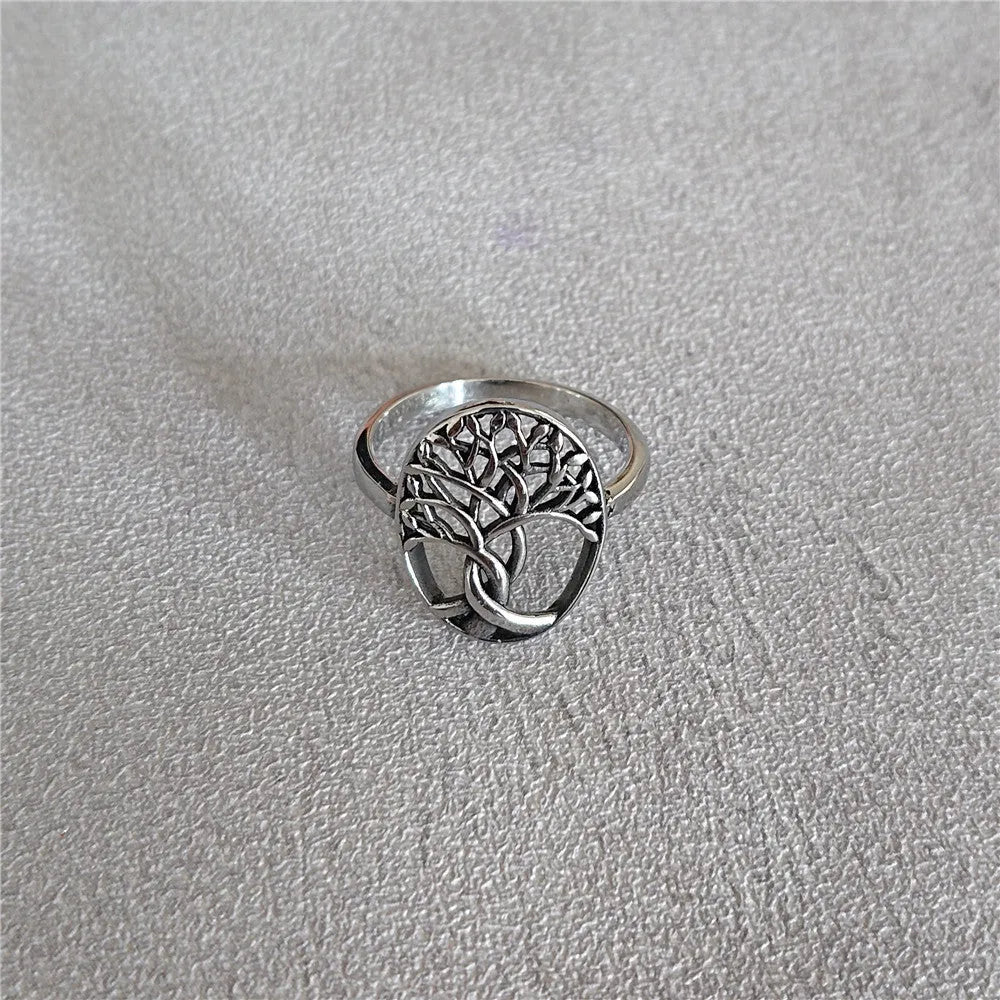 Retro Tree of Life design on a men's titanium steel ring shown in picture colour