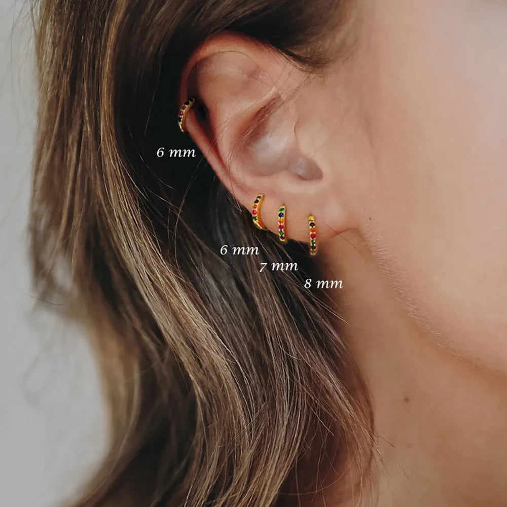 Circle zircon stud earrings in gold, rose gold and silver colours with geometric design
