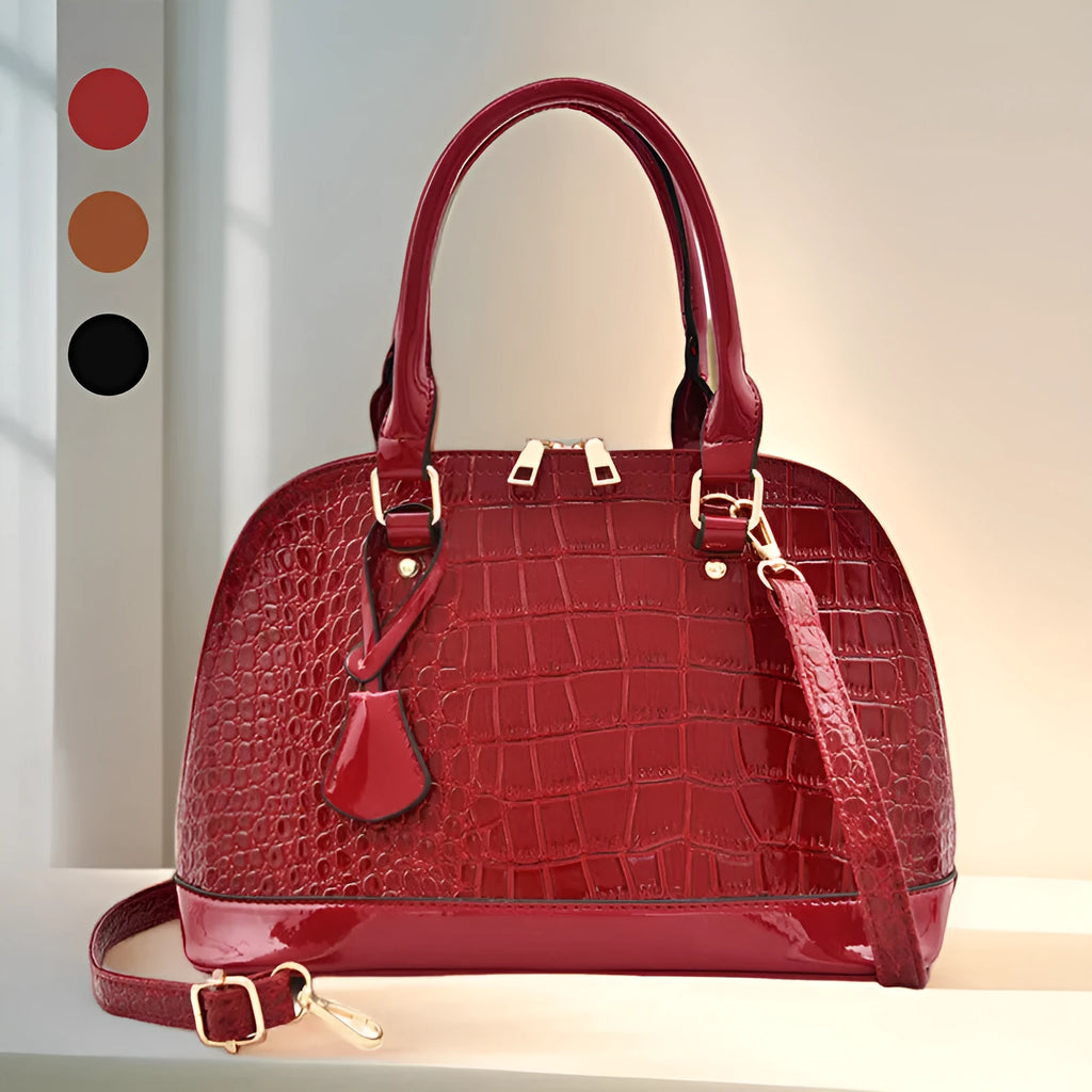 Large shiny black PU crossbody shoulder bag with shell suitcase shape on a white background.