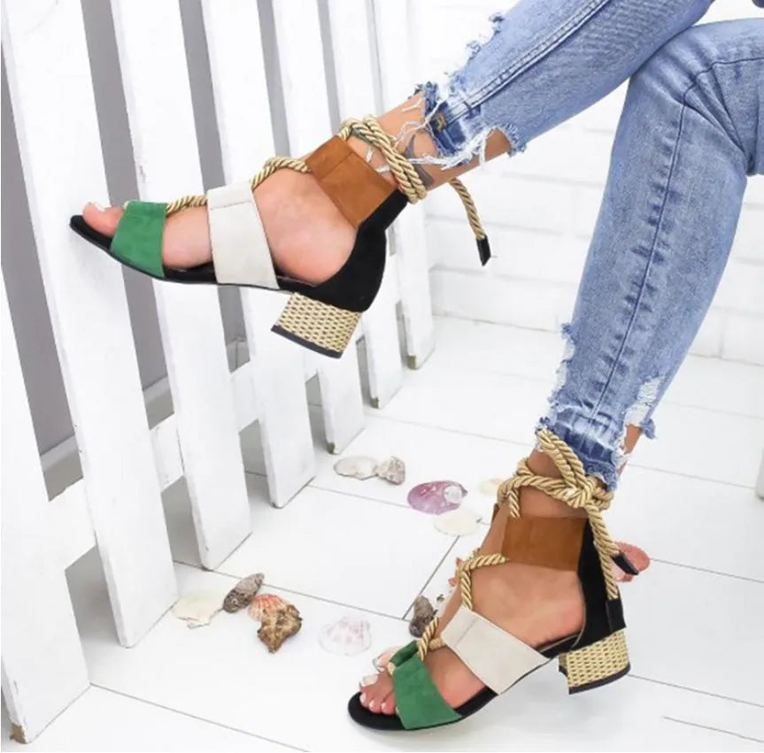 Women's beige suede sandals with thick heel, front strap, ankle strap, and fish mouth toe.