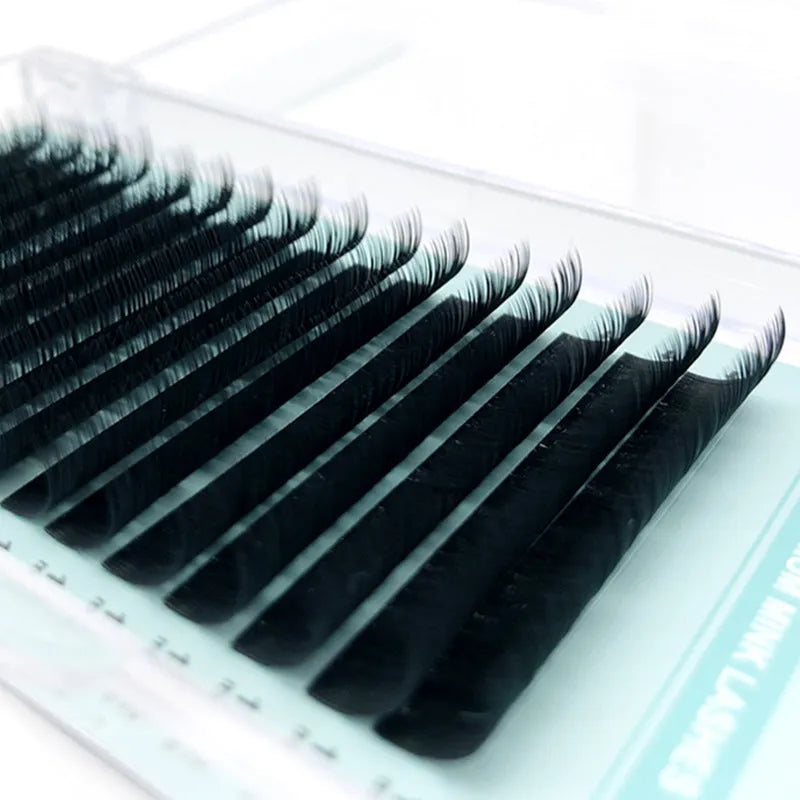 Soft velvet false eyelashes on a card, showing artificial fibre construction and available in multiple lengths.